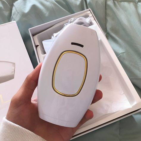 Handheld IPL laser hair removal machine for women, ideal for painless at-home hair removal