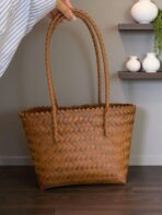 Braided tote bag with comfortable handles, perfect for everyday use