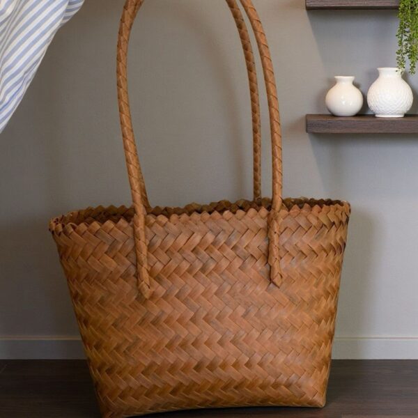 Braided tote bag with comfortable handles, perfect for everyday use