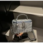 Fashionable women’s denim box bag with chain strap, square shape, and splicing design in blue