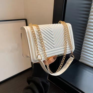Solid color mini shoulder bag with quilted texture and flap design – stylish women’s crossbody purse