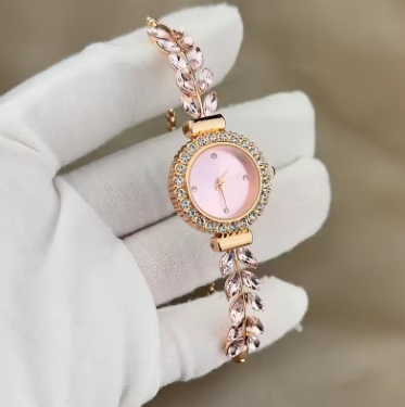 Elegant women's quartz bracelet watch with simple design and water diamond details, luxury wristwatch for everyday or formal wear